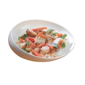 Assiette ronde avec rebord incliné aide au repas